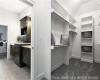 Spacious closet featuring carpet flooring
